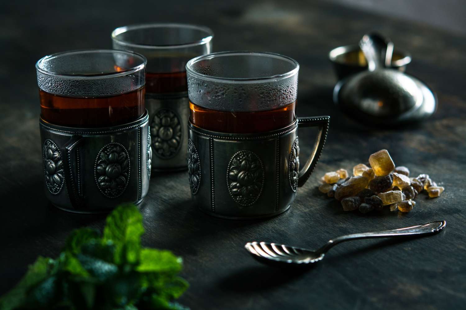 Glass jar of fruit tea infusion with dried fruit